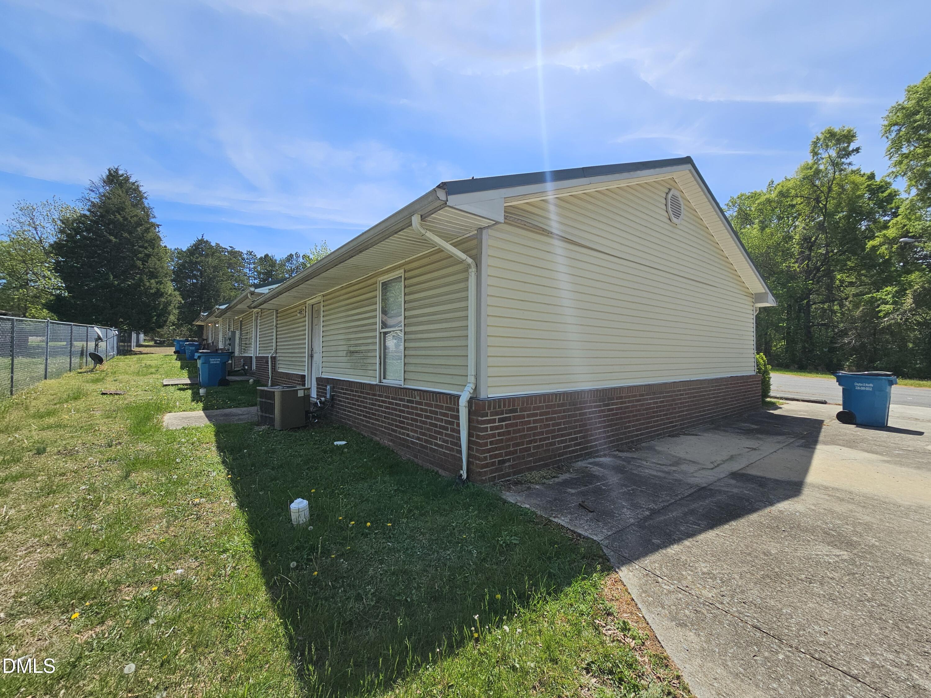 119 Lynn Drive Roxboro, NC 27573 - Photo 22 of 27 a view of back yard of the house