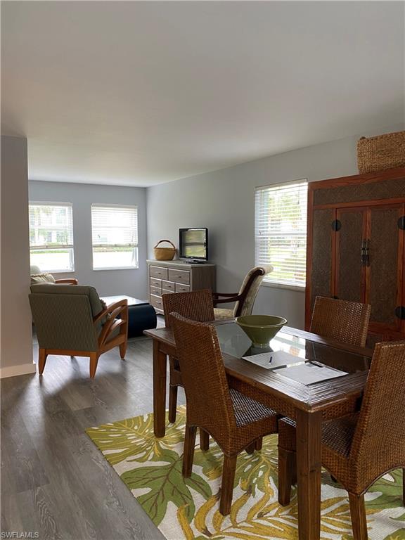 663 12th Avenue South, Unit 663 Naples, FL 34102 - Photo 4 of 5 a view of a dining room with furniture