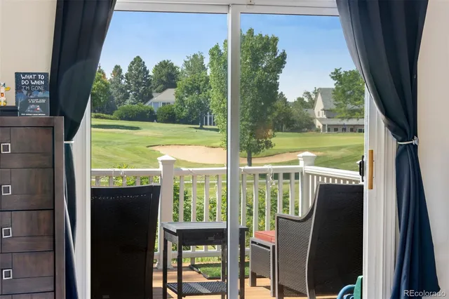 a view of a balcony with lake view