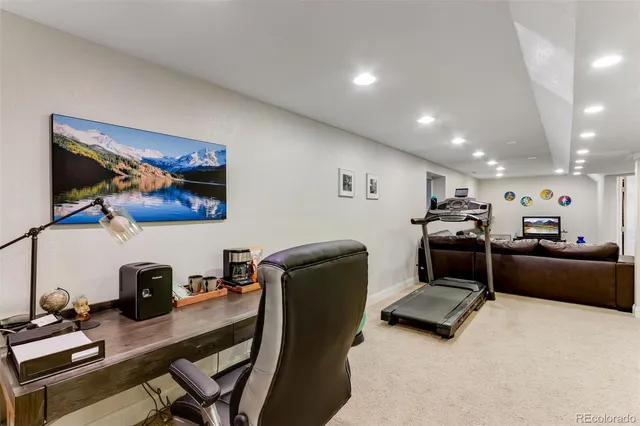 a view of a workspace with furniture