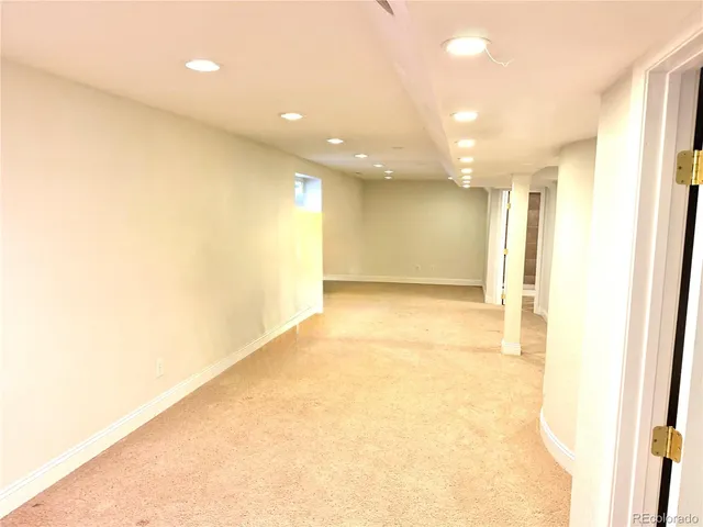 a view of hallway with a large window