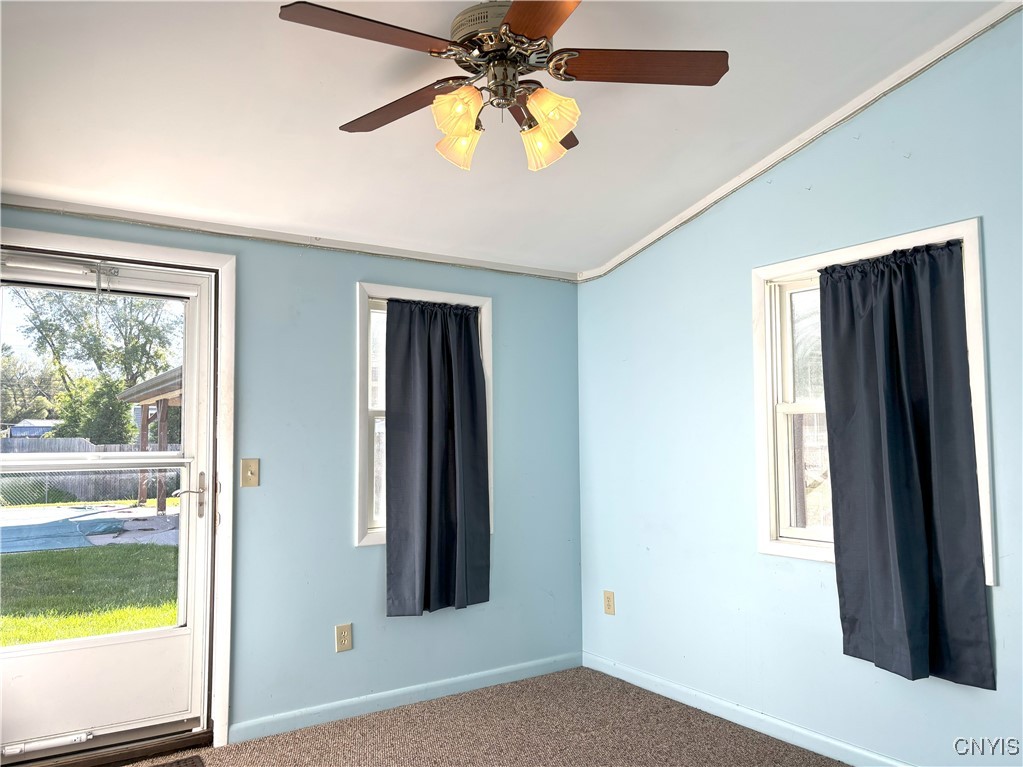 7658 Clover Road Syracuse, NY 13212 - Photo 11 of 31 3 Season Room Opens to Back Yard