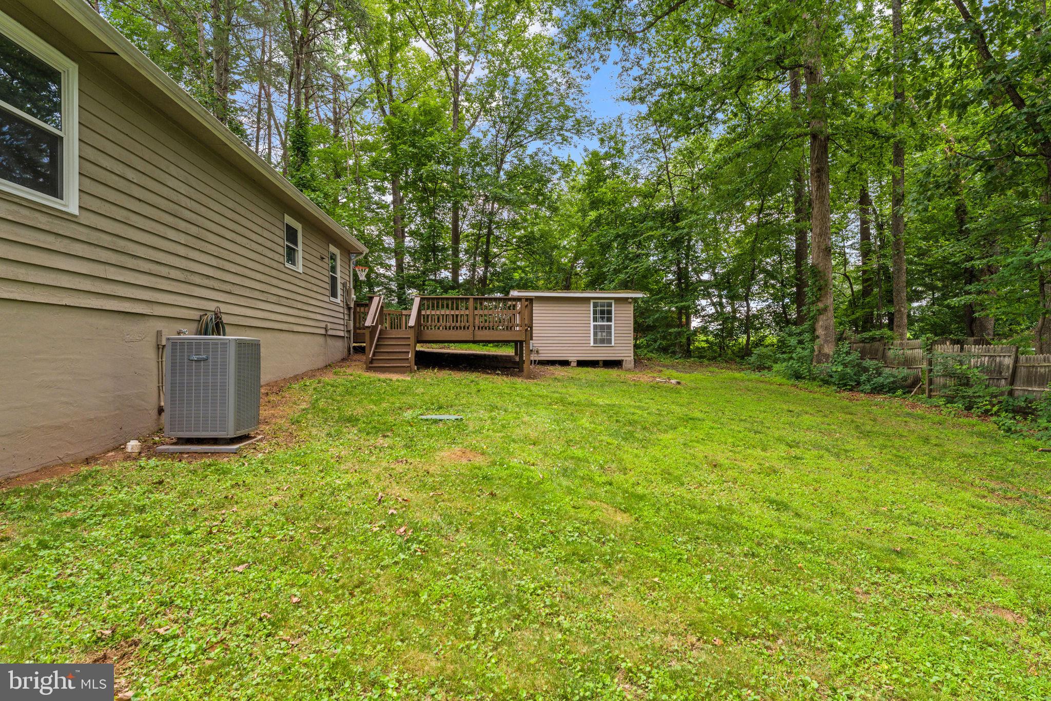 1821 James City Road Reva, VA 22735 - Photo 42 of 44 a view of a house with backyard and a tree