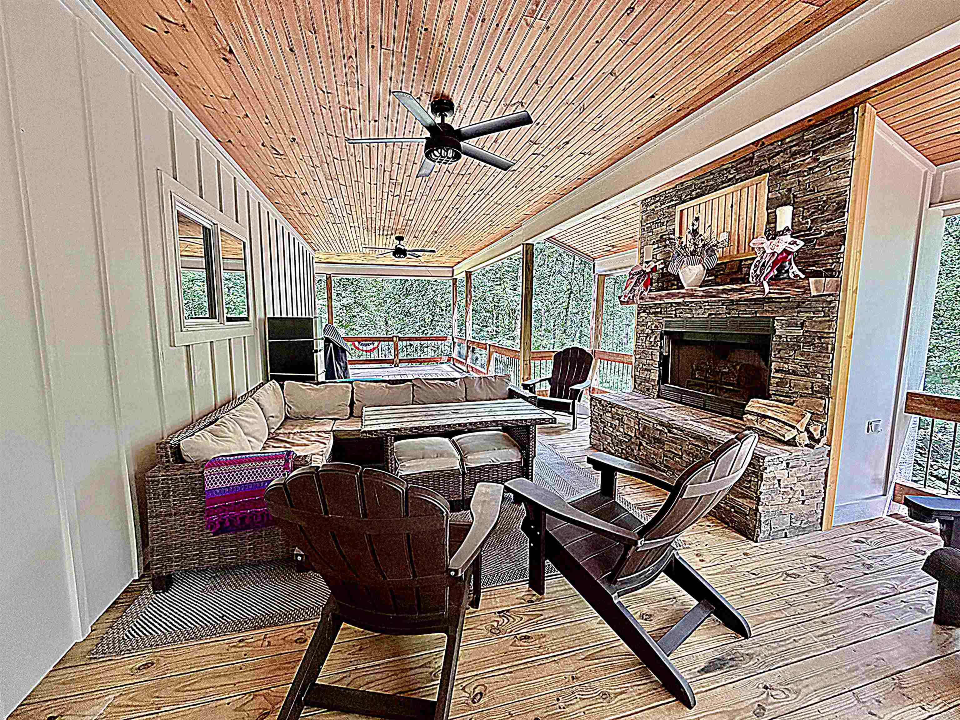 540 Muscatel Lane Counce, TN 38326 - Photo 26 of 32 a living room with furniture a fireplace and a ceiling fan
