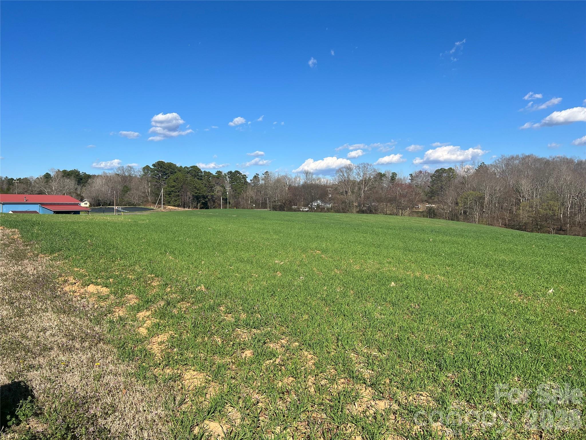 0 Bridge Road Albemarle, NC 28001 - Photo 5 of 7 a view of a yard with a house in the background
