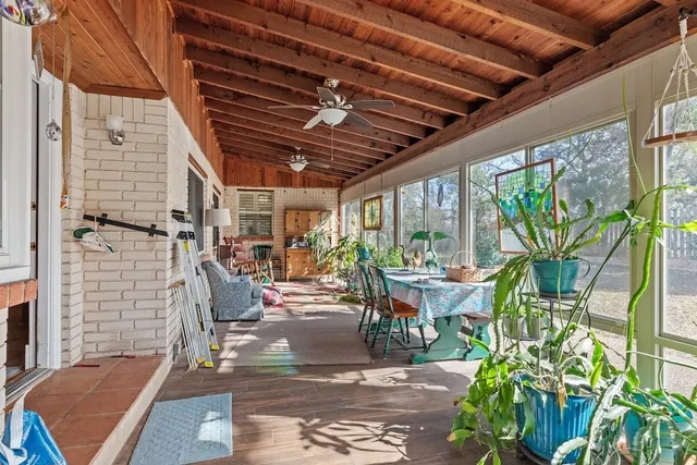 a view of a house with a yard and plants