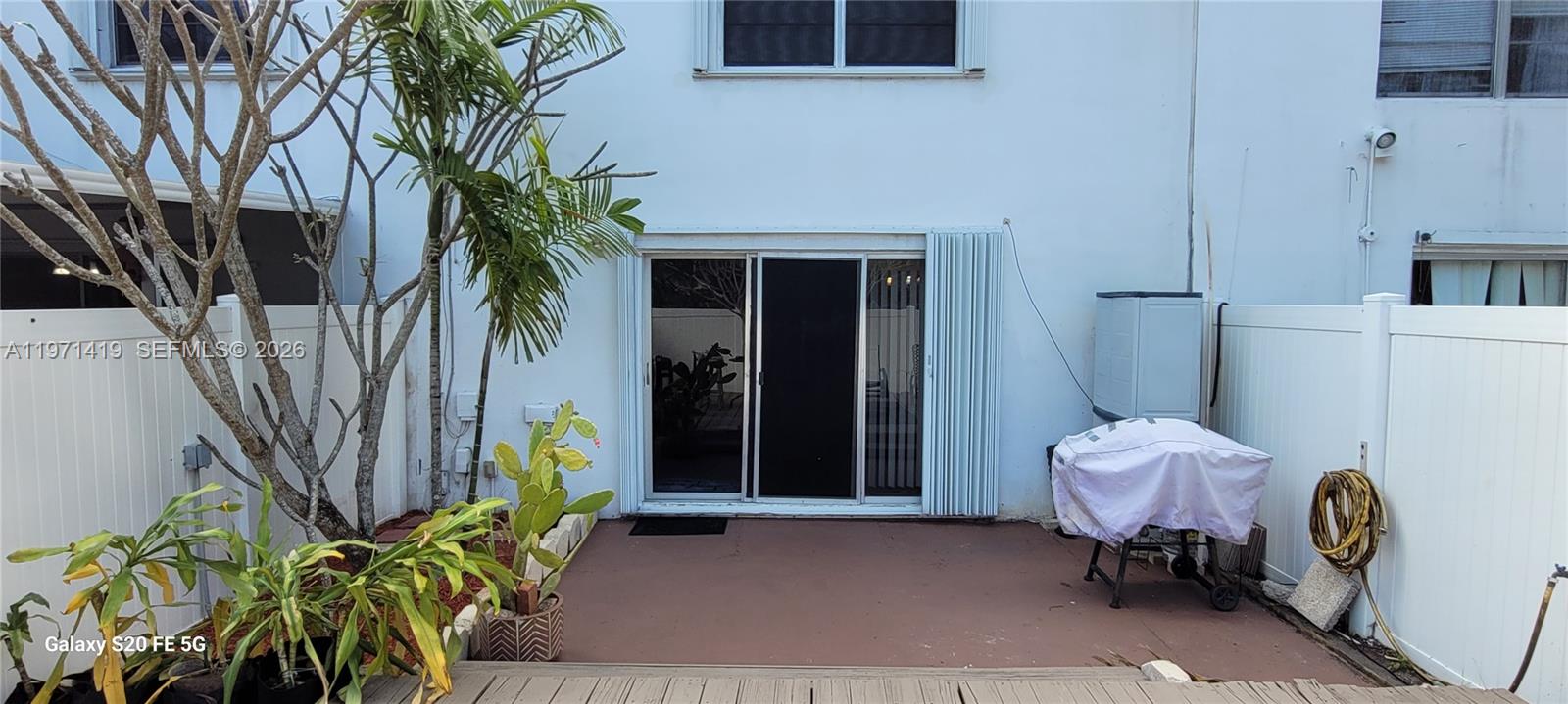 4036 Southwest 67th Terrace, Unit 5 Davie, FL 33314 - Photo 17 of 21 a entryway with furniture and a potted plant