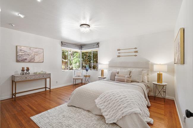 3324 Woodside Road Woodside, CA 94062 - Photo 17 of 60 a bedroom with a bed and a table