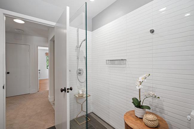 3324 Woodside Road Woodside, CA 94062 - Photo 26 of 60 a bathroom with a shower and a toilet