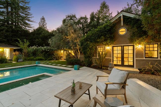 3324 Woodside Road Woodside, CA 94062 - Photo 3 of 60 a view of a house with swimming pool and sitting area
