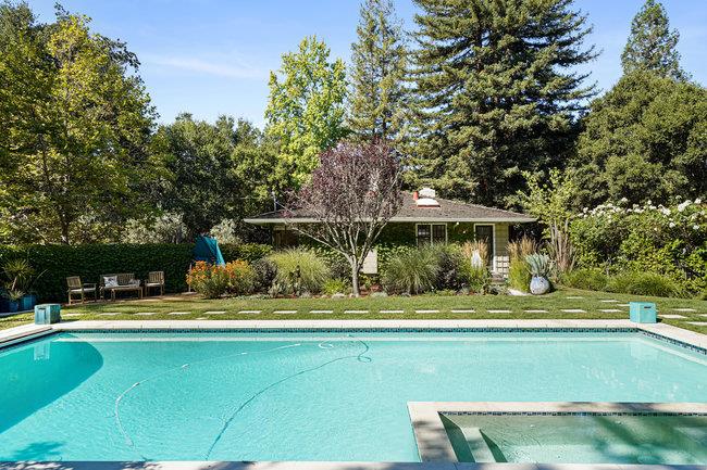 3324 Woodside Road Woodside, CA 94062 - Photo 39 of 60 a view of a swimming pool with a yard