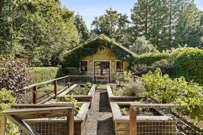 3324 Woodside Road Woodside, CA 94062 - Photo 49 of 60 a view of a roof deck with couches and wooden fence