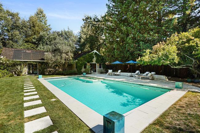3324 Woodside Road Woodside, CA 94062 - Photo 5 of 60 a view of a swimming pool with a patio and a yard