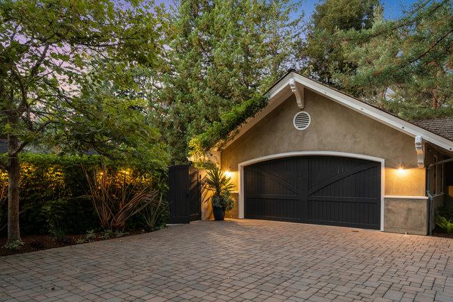 3324 Woodside Road Woodside, CA 94062 - Photo 59 of 60 a front view of a house with a yard and garage