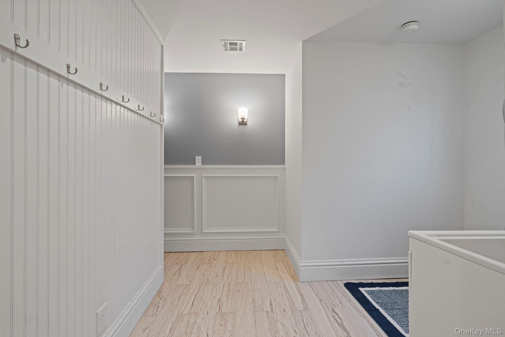 25 Cliff Road West Wading River, NY 11792 - Photo 20 of 35 a view of an empty walk in closet