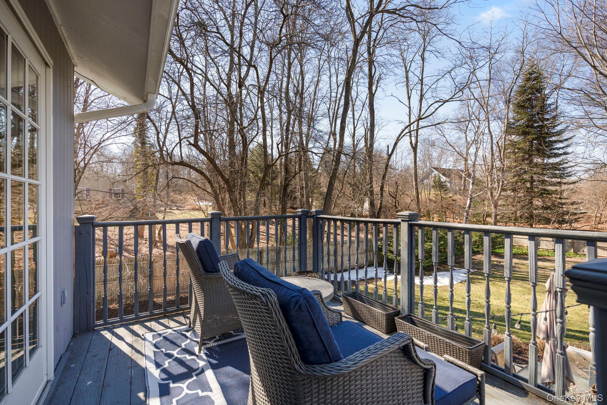 25 Cliff Road West Wading River, NY 11792 - Photo 25 of 35 a view of balcony with wooden floor and outdoor seating