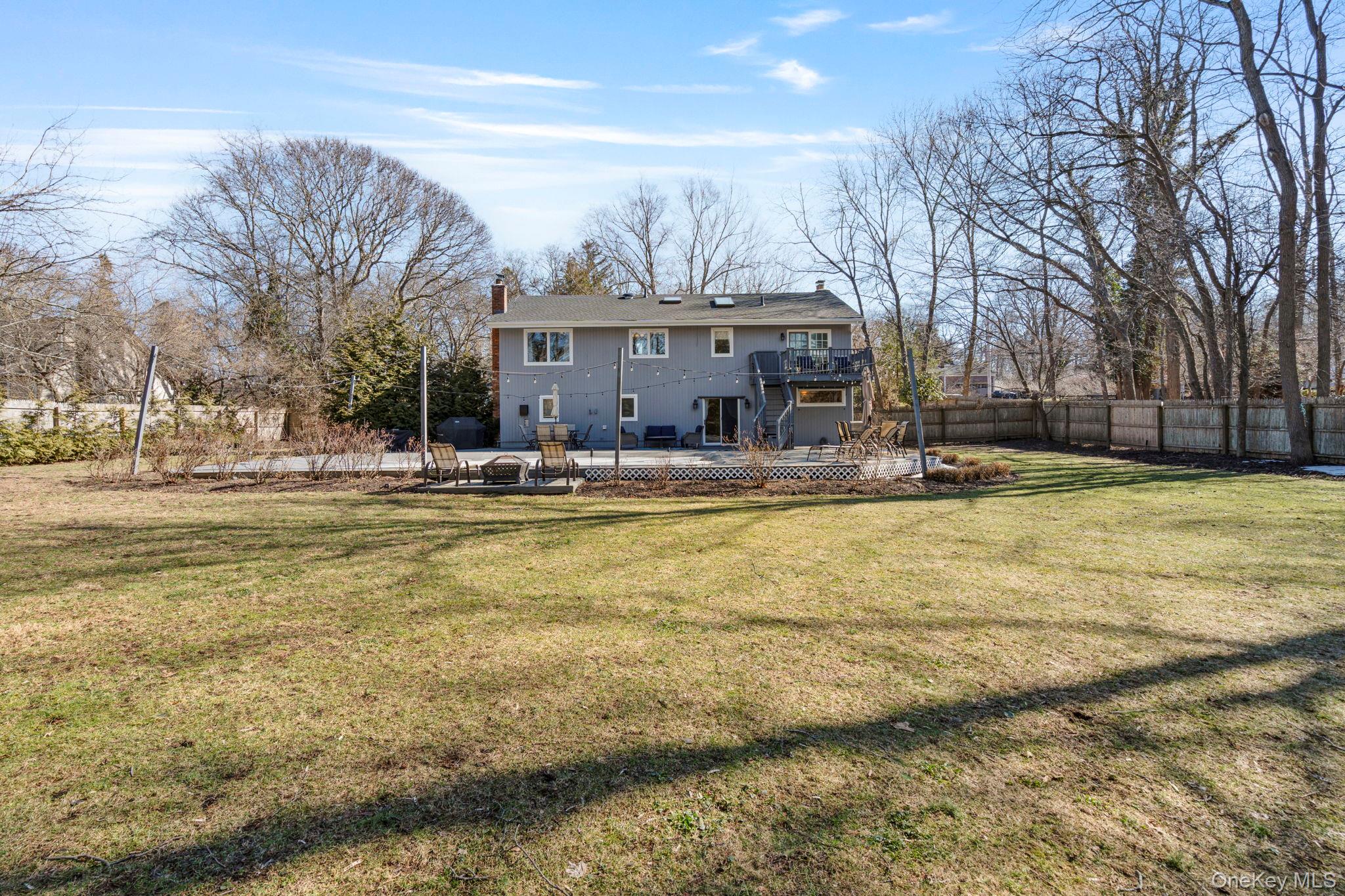 25 Cliff Road West Wading River, NY 11792 - Photo 27 of 35 a view of a house with swimming pool and sitting area