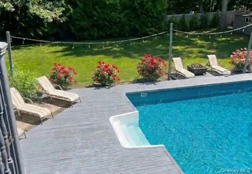 an aerial view of residential building and ocean