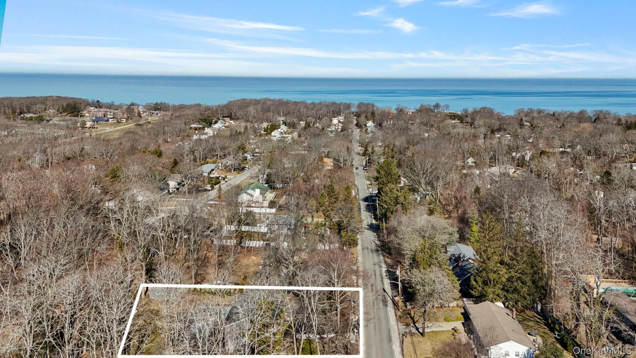 25 Cliff Road West Wading River, NY 11792 - Photo 32 of 35 an aerial view of residential building and ocean