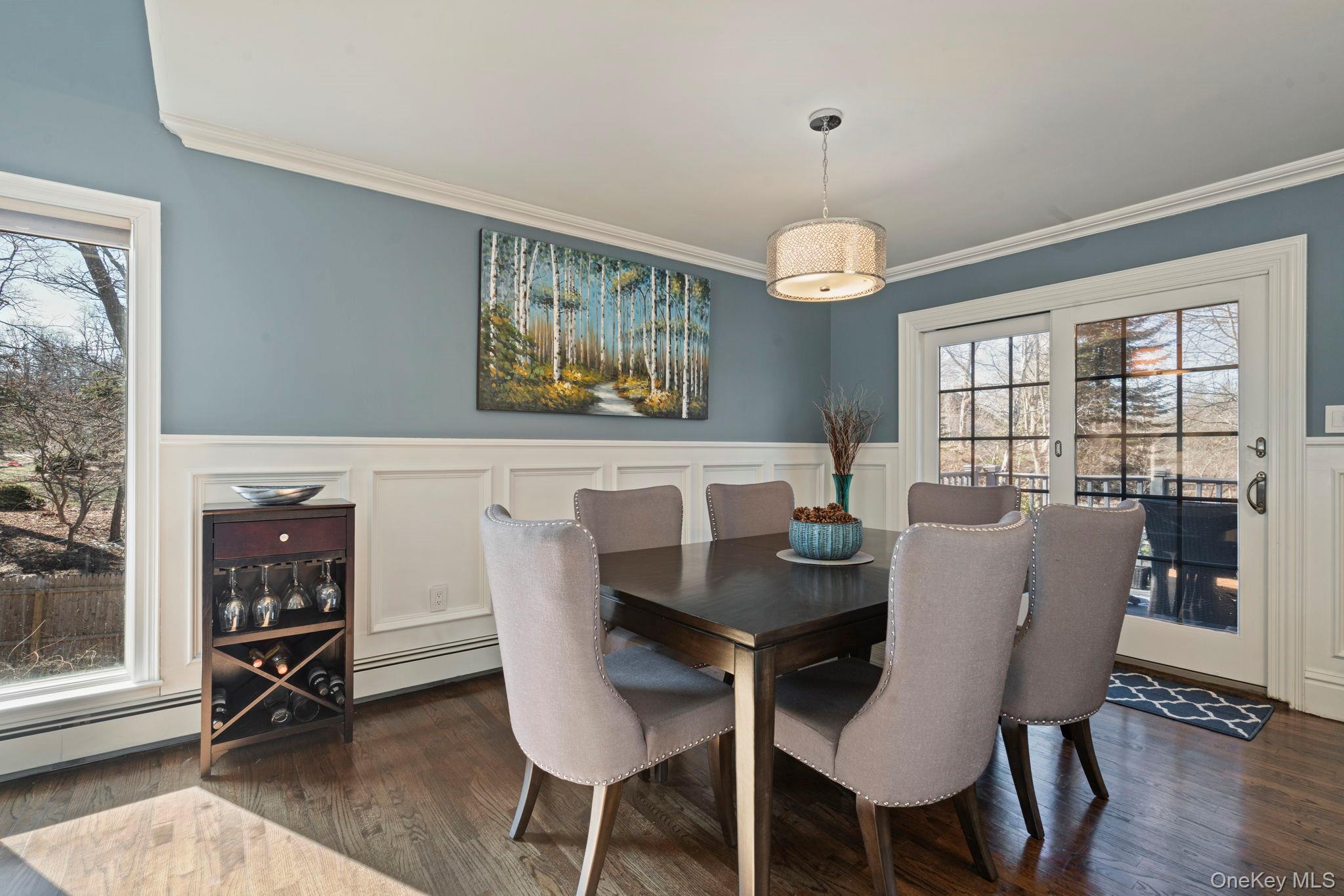 25 Cliff Road West Wading River, NY 11792 - Photo 7 of 35 a view of a dining room with furniture window and wooden floor