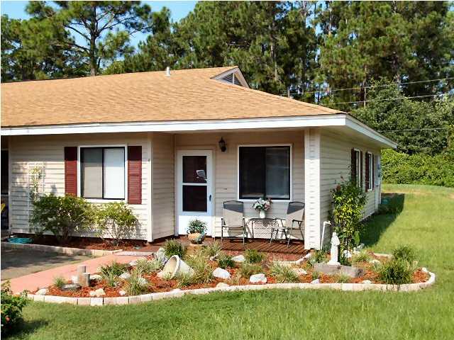 a view of house with outdoor space