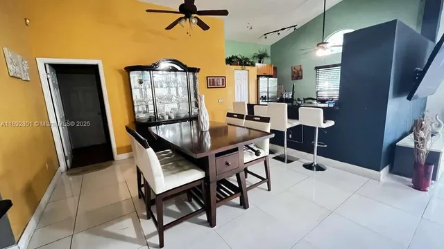 a view of a livingroom with furniture window and wooden floor