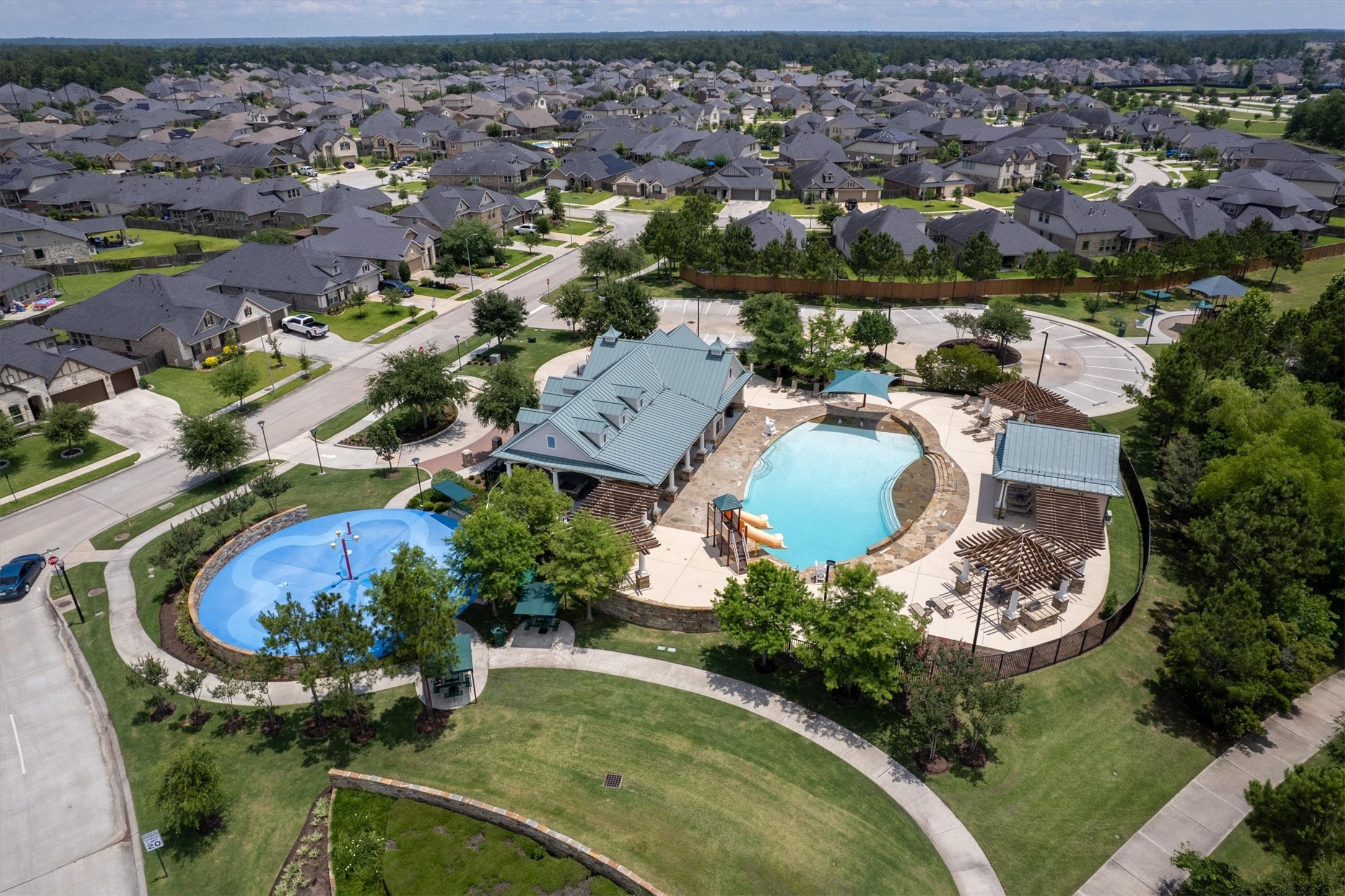 3639 Cottage Pines Lane Spring, TX 77386 - Photo 27 of 31 Enjoy The Retreat pool, splashpad, and community room as well
