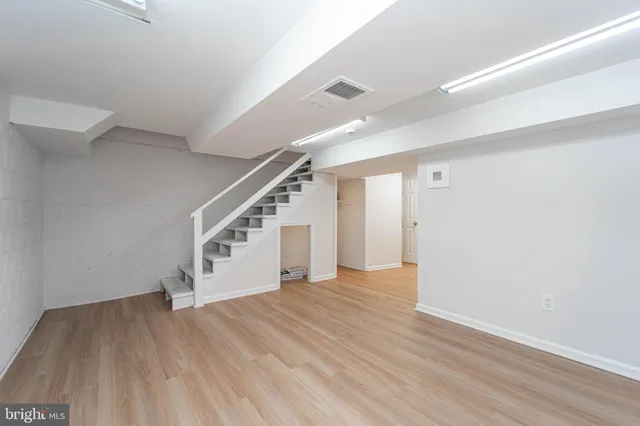 a view of entryway with wooden floor