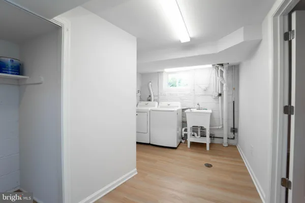 a room with a chair and a window