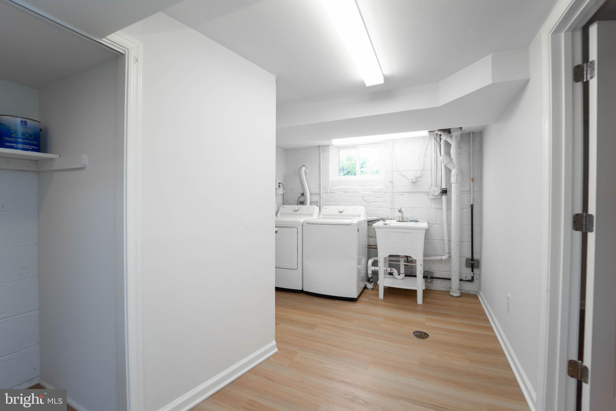 8909 Georgia Avenue Silver Spring, MD 20910 - Photo 29 of 47 a room with a chair and a window