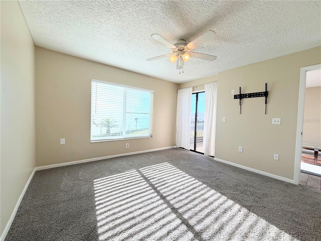 4550 Bay Boulevard, Unit 1224 Port Richey, FL 34668 - Photo 15 of 25 a view of an empty room with a window