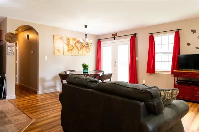 a living room with a couch and a flat screen tv