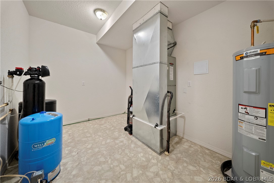 2247 Breezy Acres Road Osage Beach, MO 65065 - Photo 30 of 53 Utility Room has lots of open storage