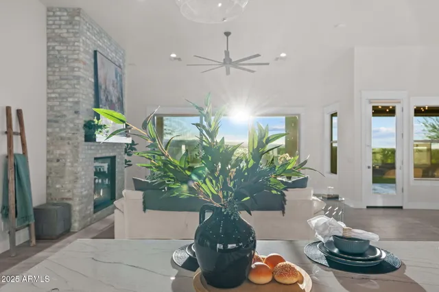 a kitchen with lots of counter top space and stainless steel appliances