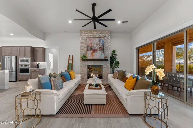 a view of a kitchen counter space a sink and living room