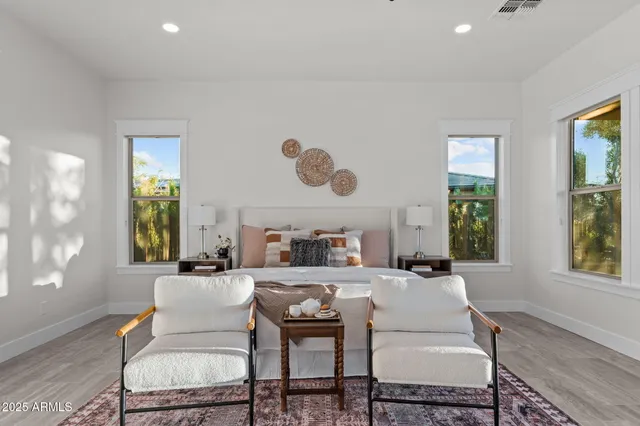 a view of a swimming pool with an outdoor seating