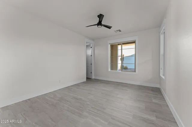 a front view of a house with yard outdoor seating and barbeque oven