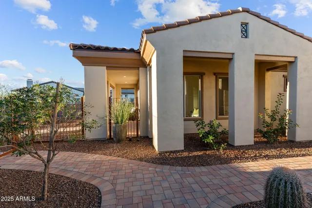 an aerial view of residential houses with city view