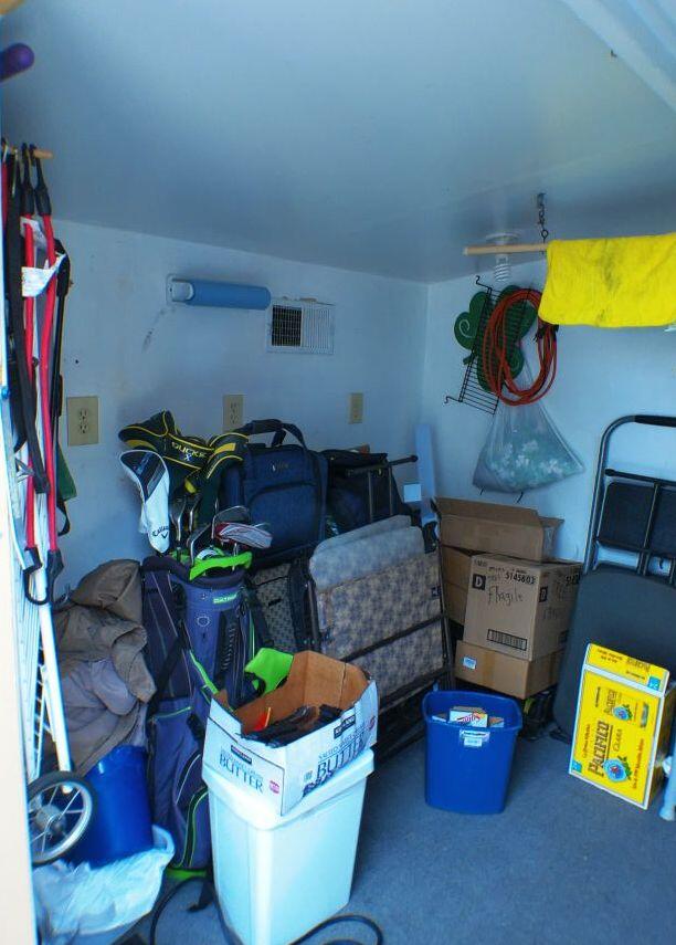 84136 Ave 44, Unit 587 Indio, CA 92203 - Photo 14 of 36 a living room with furniture and a fireplace
