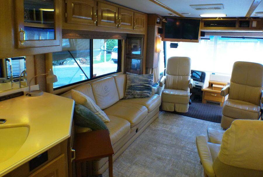 84136 Ave 44, Unit 587 Indio, CA 92203 - Photo 18 of 36 a living room with furniture and a window