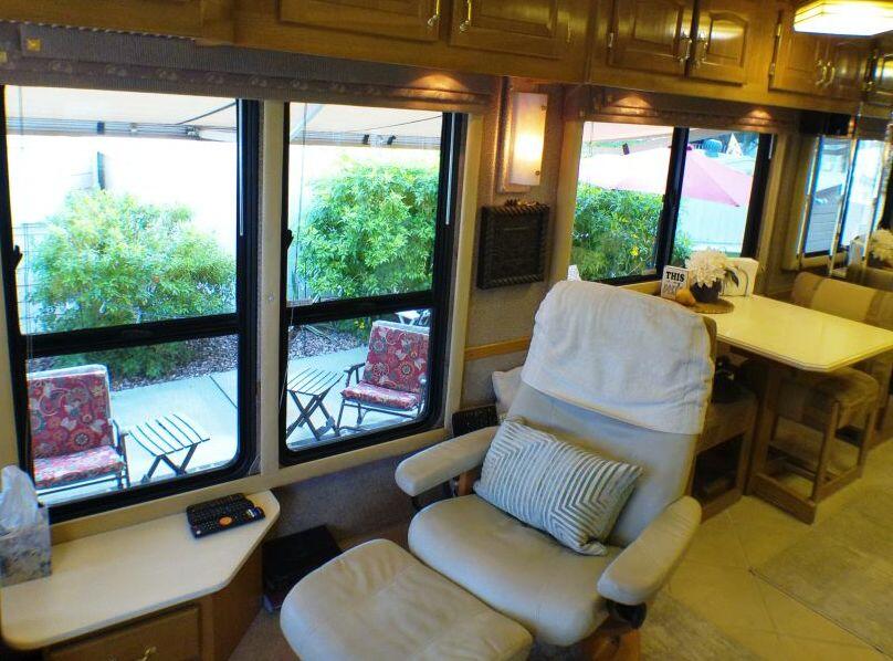 84136 Ave 44, Unit 587 Indio, CA 92203 - Photo 21 of 36 a living room with furniture and a large window