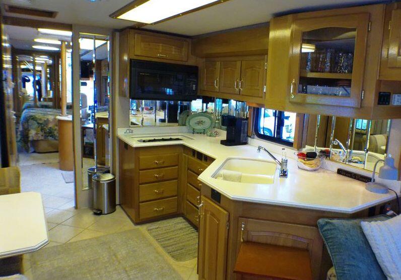 84136 Ave 44, Unit 587 Indio, CA 92203 - Photo 22 of 36 a kitchen with a sink and cabinets