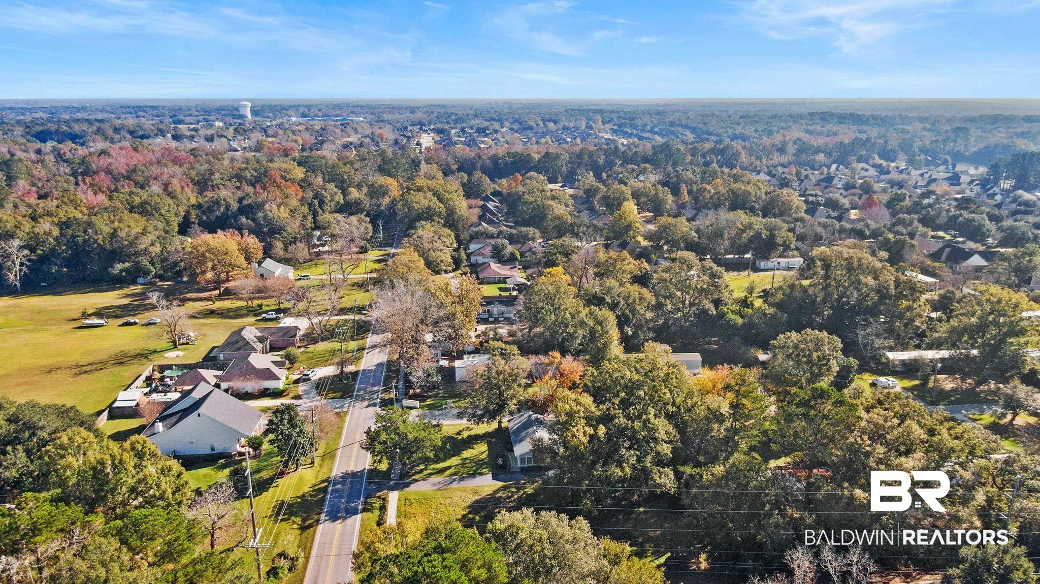 20202 County Road 13 Fairhope, AL 36532 - Photo 14 of 20 View of property location with a heavily wooded area and nearby suburban area