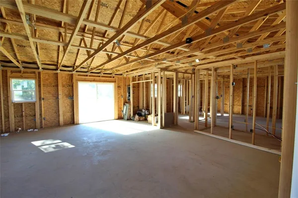 a view of empty room with windows
