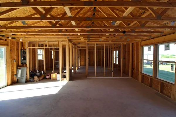 a view of a room with wooden walls
