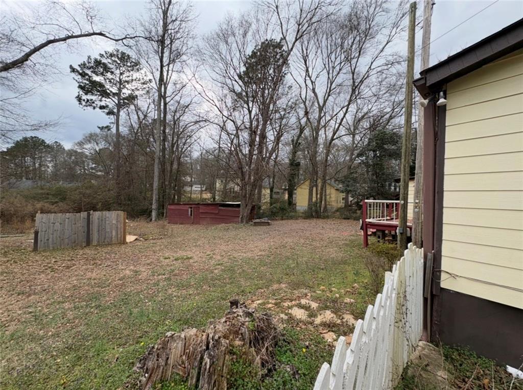 643 Dailey Mill Road McDonough, GA 30253 - Photo 5 of 17 a view of backyard with trees