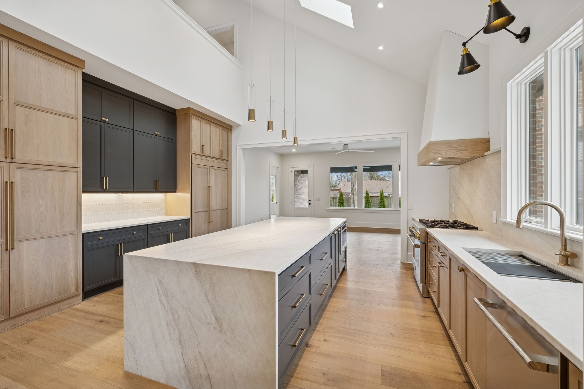 1130 Winding Way Road Nashville, TN 37216 - Photo 1 of 96 a large kitchen with kitchen island a sink stove and a refrigerator
