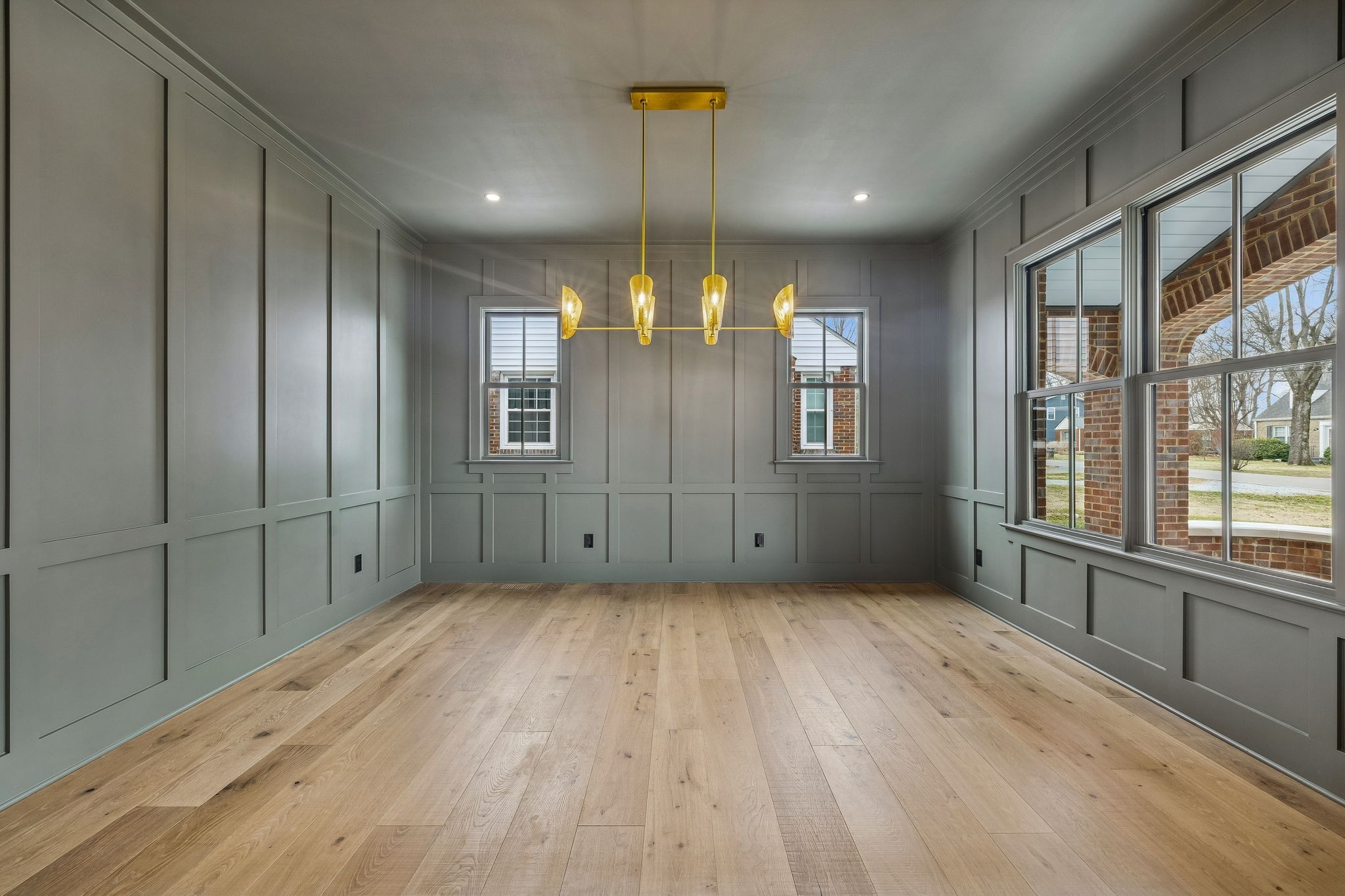1130 Winding Way Road Nashville, TN 37216 - Photo 15 of 96 a view of an empty room with wooden floor and windows