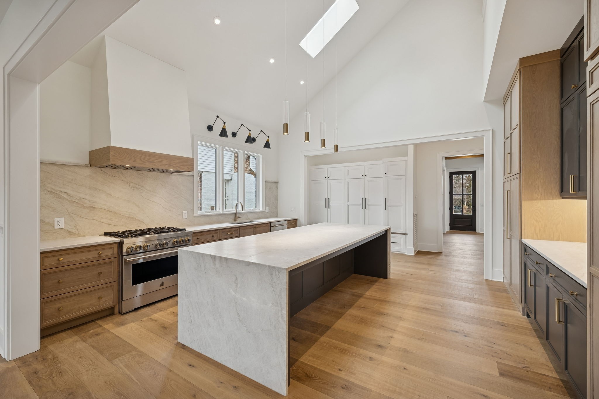 1130 Winding Way Road Nashville, TN 37216 - Photo 21 of 96 a large kitchen with stainless steel appliances granite countertop a stove and a refrigerator