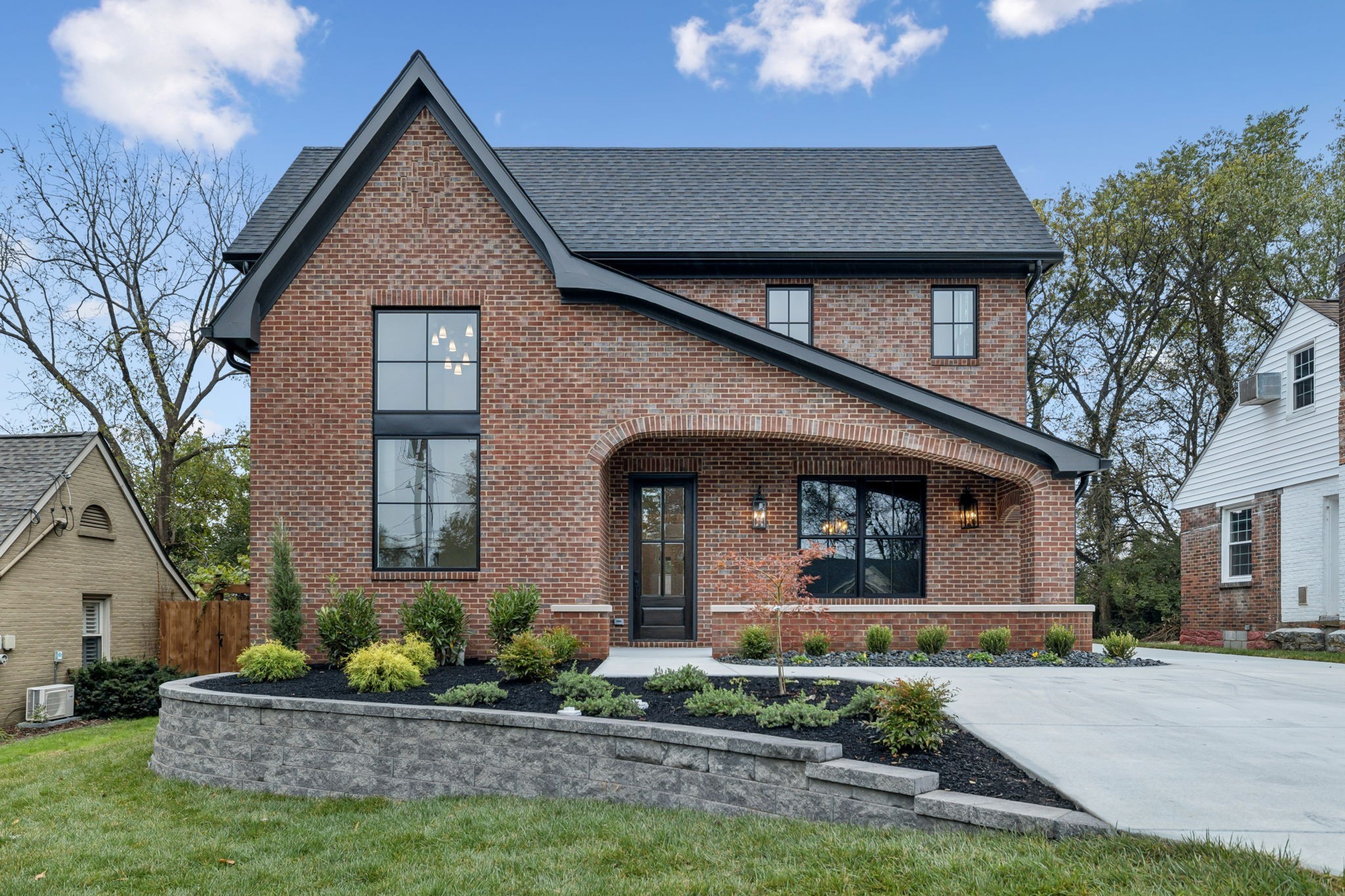 1130 Winding Way Road Nashville, TN 37216 - Photo 3 of 96 a front view of a house with a garden